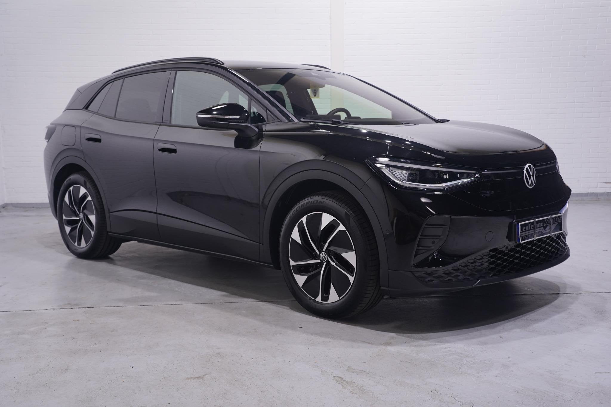 Volkswagen ID.4 Pro Business 77 kWh SOH 95% NAP Warmtepomp 2, Auto's, Achterwielaandrijving, Gebruikt, Zwart, Grijs