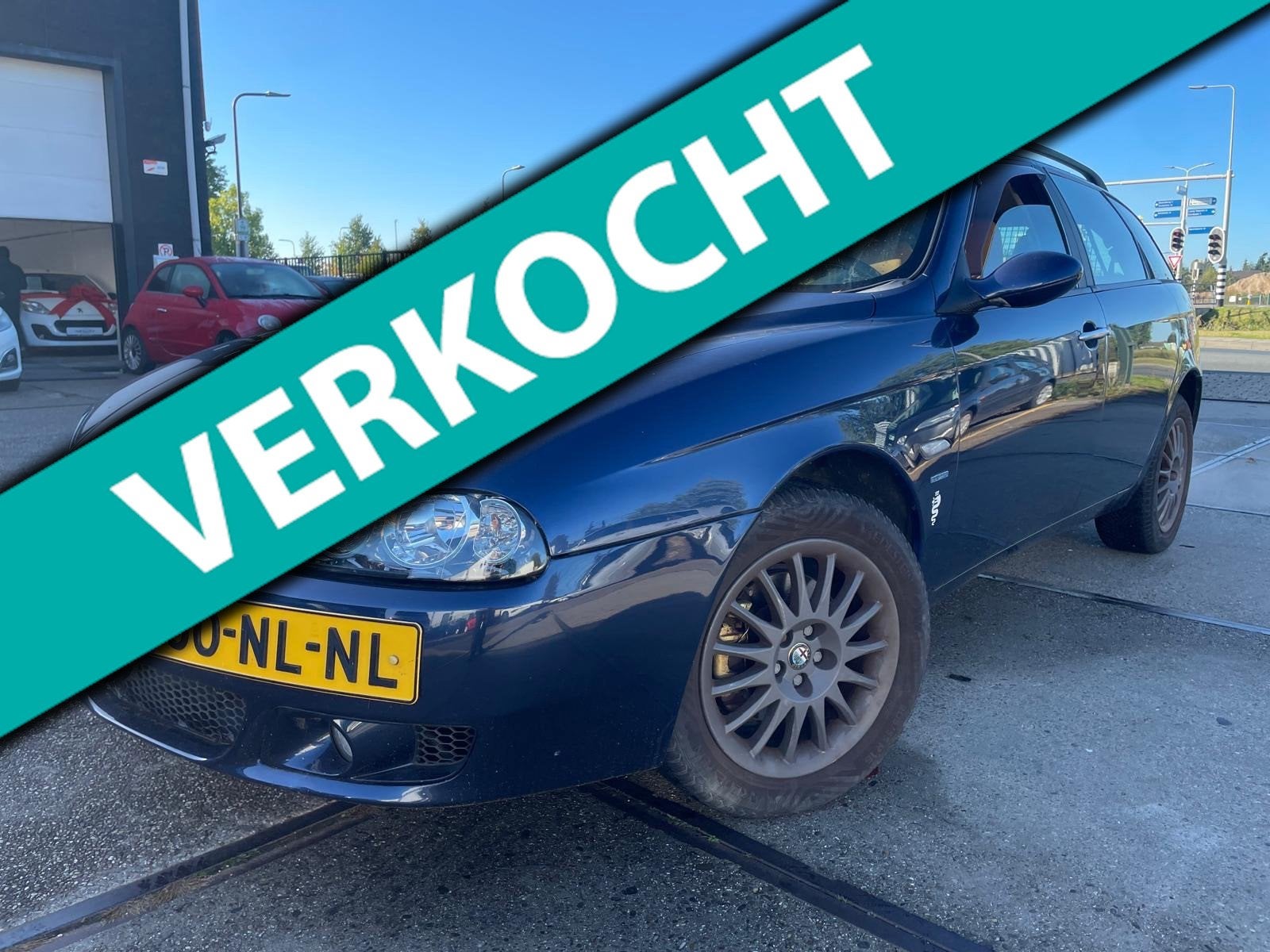Alfa Romeo 156 Sportwagon 2.0 JTS Distinctive, Auto's, Voorwielaandrijving, Verwarmde buitenspiegels, Gebruikt, Blauw