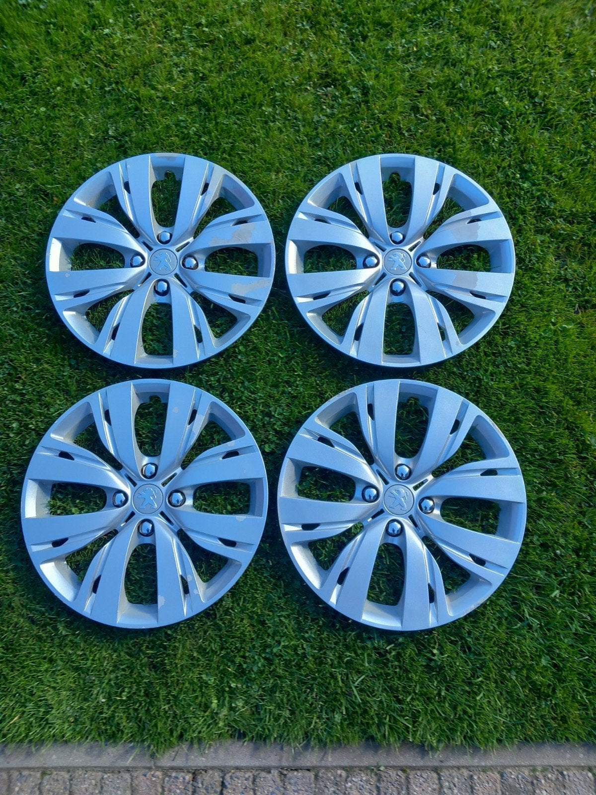 Peugeot wieldoppen 15 inch., Ophalen of Verzenden, Gebruikt