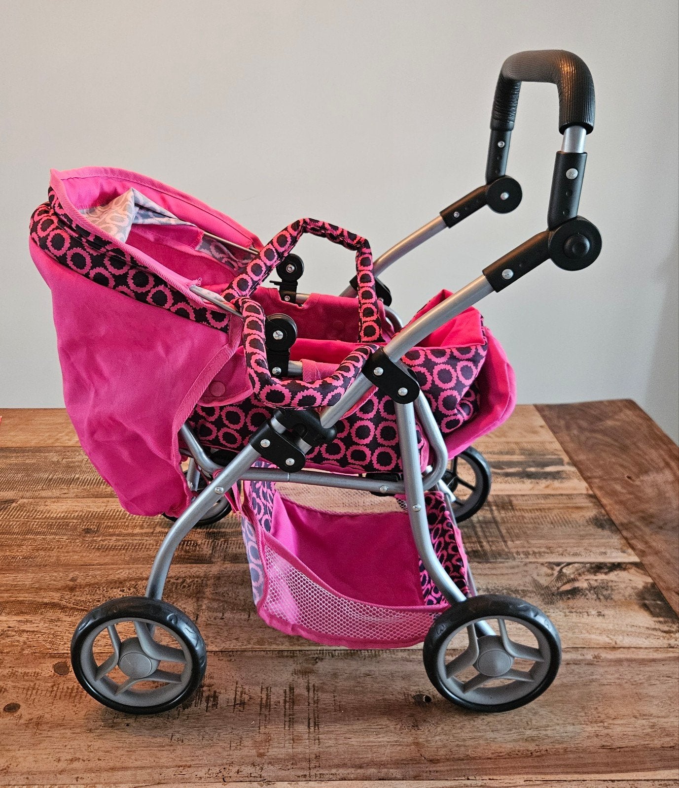 Roze poppenwagen met verstelbare duwstang, Kinderen en Baby's, Ophalen of Verzenden, Gebruikt, Babypop