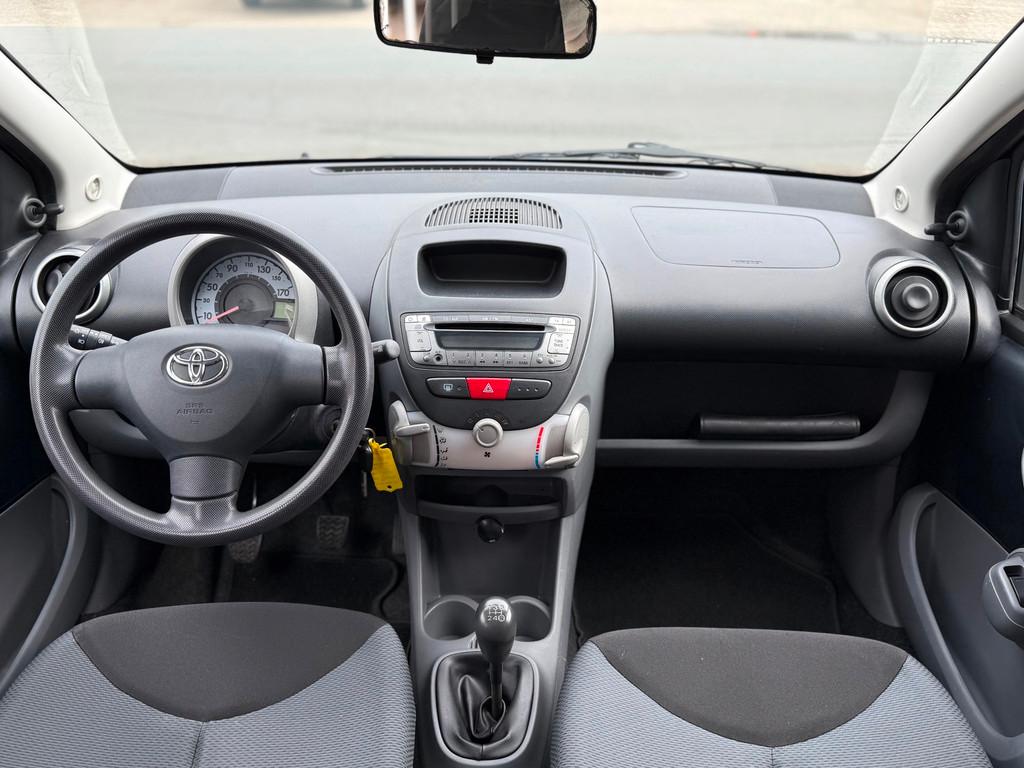 Toyota Aygo 1.0-12V +|El Ramen|5-drs|AUX|NAP|APK, Voorwielaandrijving, Stof, Huisgarantie, Met garantie (alle)