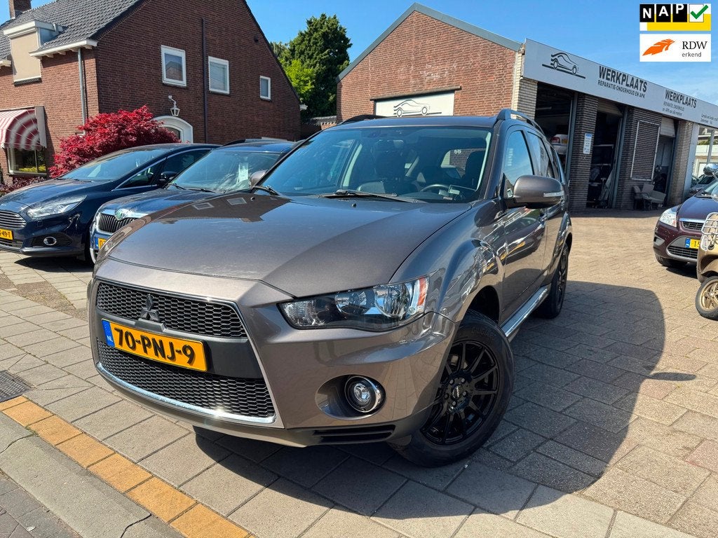 Mitsubishi Outlander 2.0 Intro Edition AUTOMAAT/CAMERA/CRUIS, Auto's, Mitsubishi, 4 cilinders, Bruin, Multifunctioneel stuurwiel