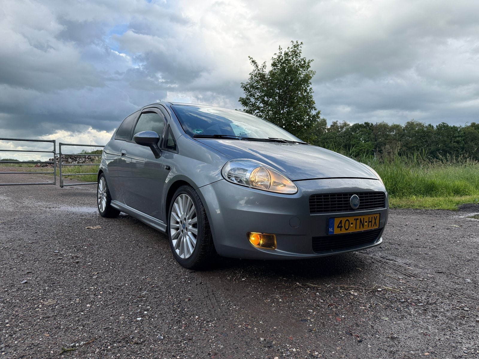 Fiat Grande Punto 1.4 16V 3DR 2006 Grijs Nieuwe koppeling!, Auto's, Fiat, Voorwielaandrijving, 40 €/maand, Origineel Nederlands