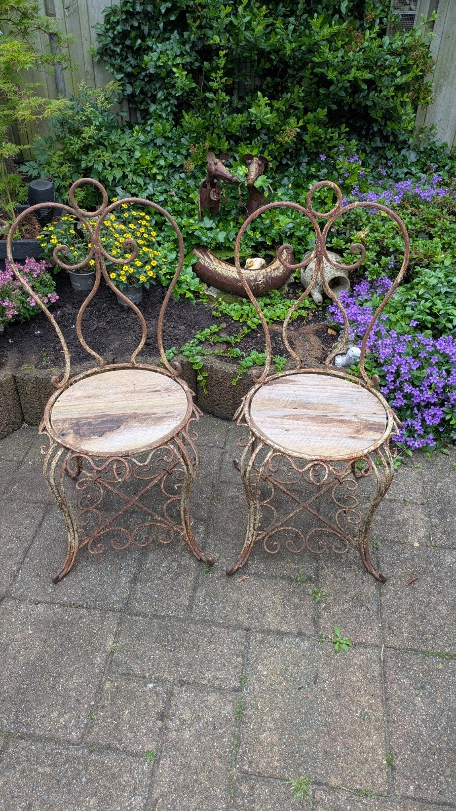 2 Smeedijzeren tuinstoeltjes, Ophalen