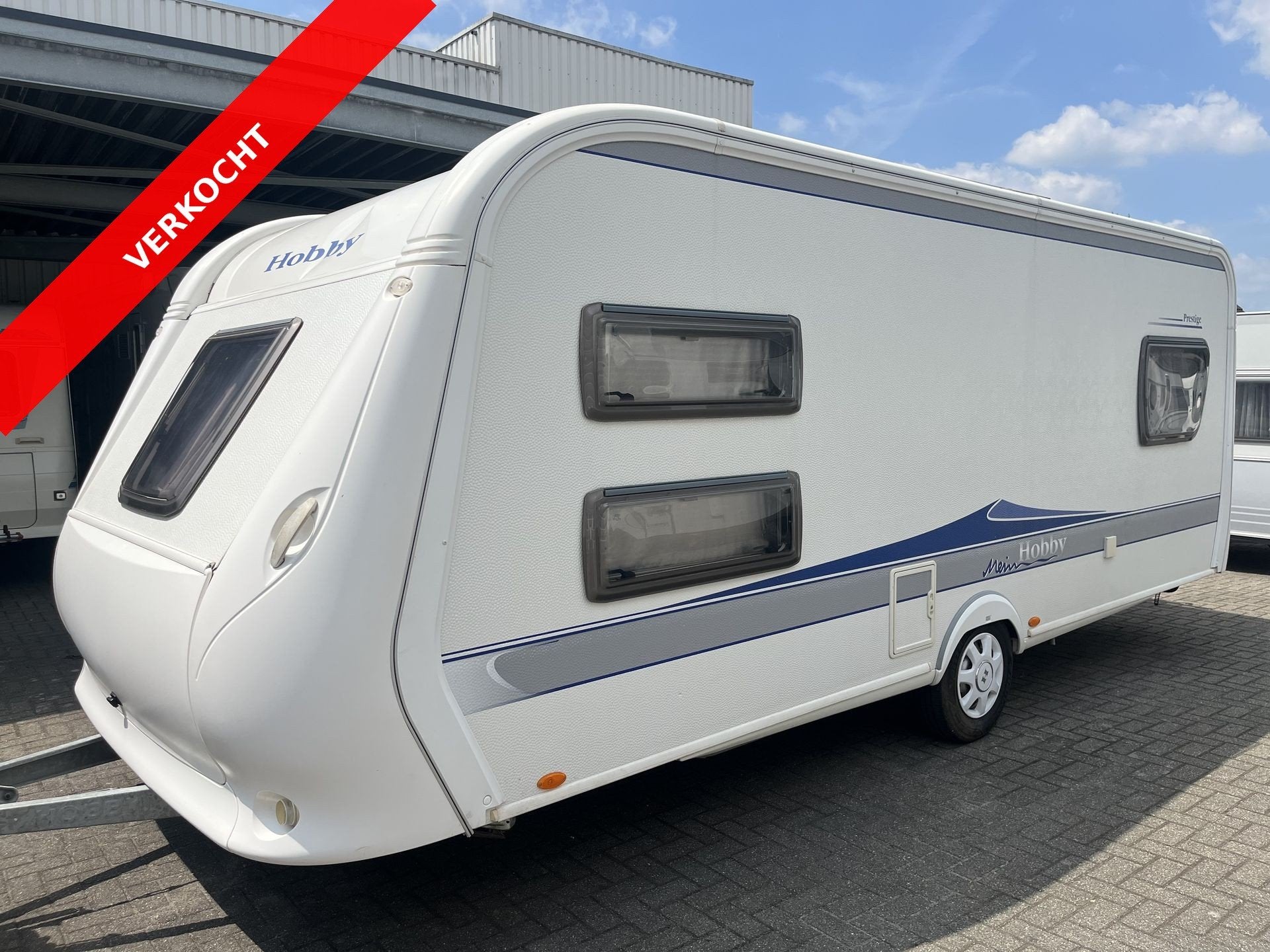 Hobby 560 UKF Prestige VERKOCHT (bj 2009), Schokbreker, Hobby, Bedrijf, 5 tot 6 meter