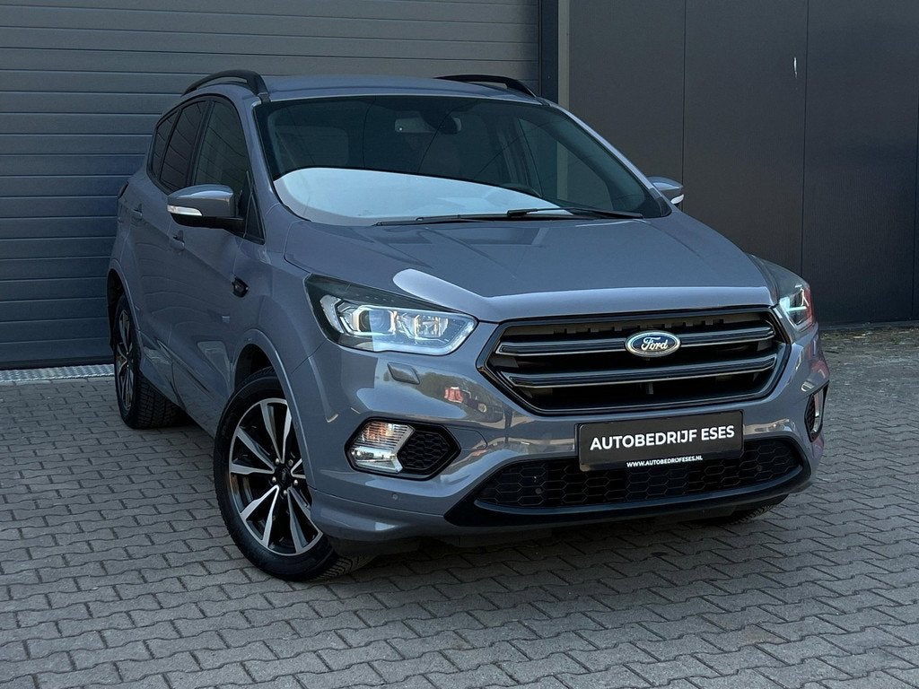 Ford Kuga 1.5 EcoBoost ST Line |CARPLAY|KEYLESS|STUURVW.|CAM, 4 cilinders, Leder en Stof, Bedrijf, Zilver of Grijs