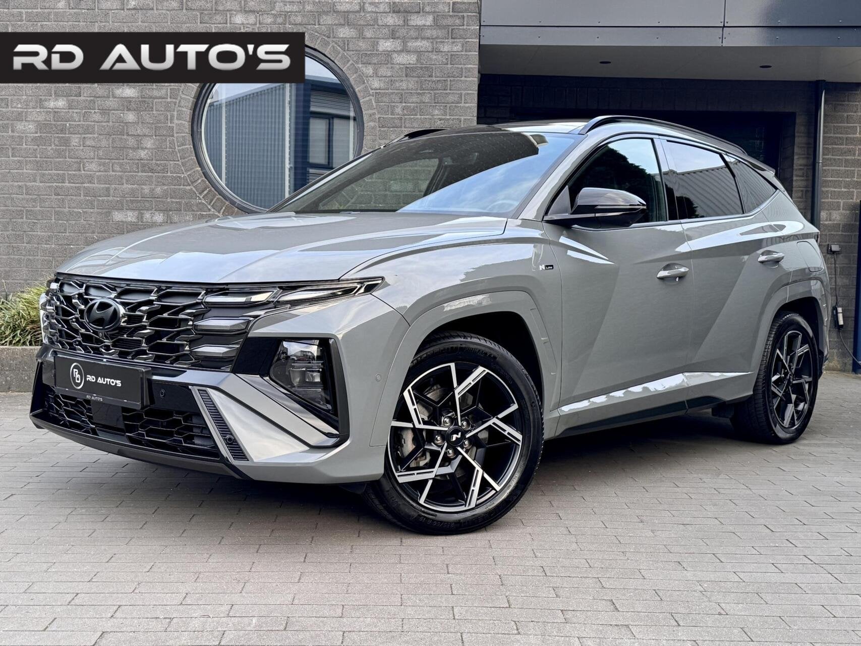 Hyundai Tucson 1.6 T-GDI PHEV N Line Sky 4WD 360 Carplay P, Auto's, Automaat, Dealer onderhouden, Adaptive Cruise Control, Zwart
