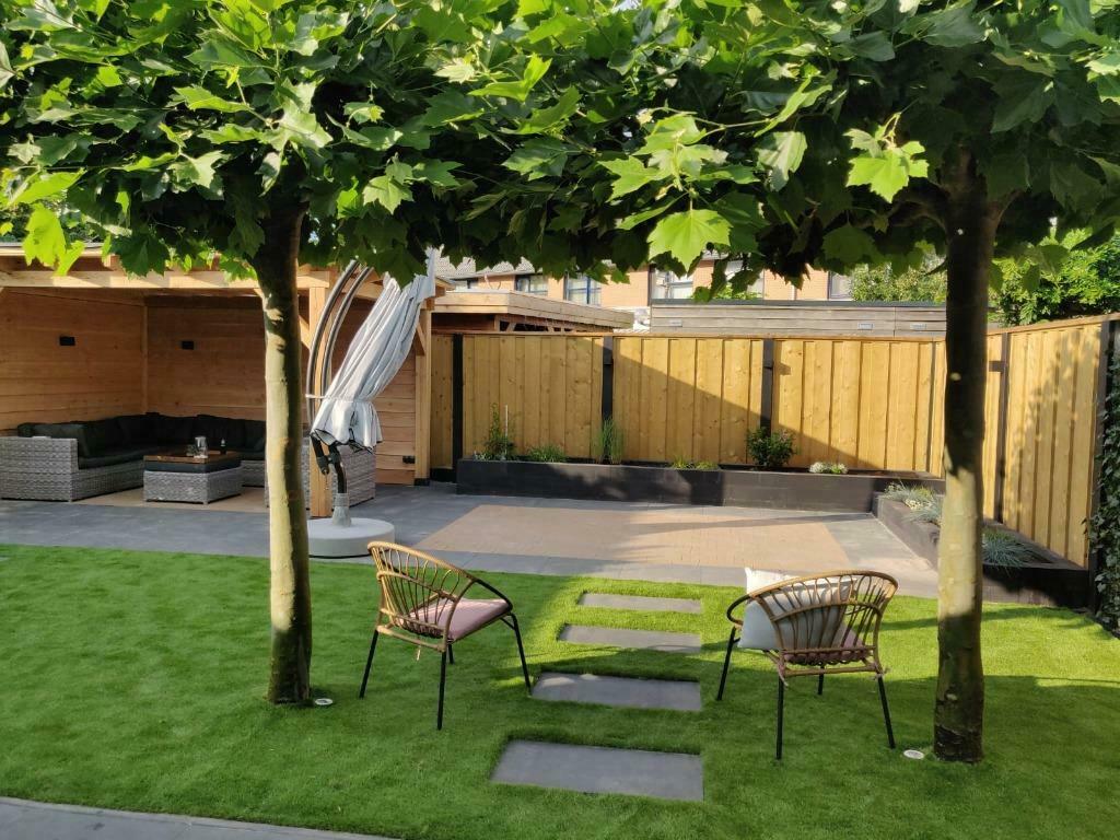 Heijink Bestrating, Grondwerk, Tuinaanleg, Tuinonderhoud, Diensten en Vakmensen, Tuinmannen en Stratenmakers, Garantie, Tuinontwerp