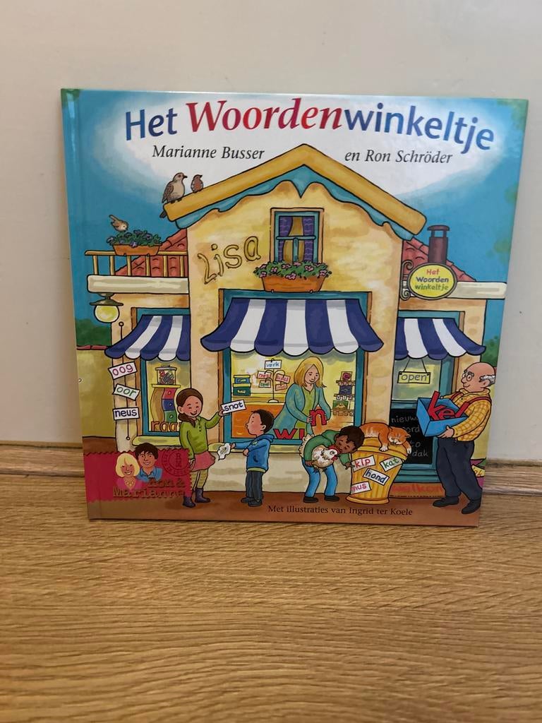 Het Woordenwinkeltje - Marianne Busser & Ron Schröder, Boeken, Ophalen of Verzenden, Zo goed als nieuw, Uitklap-, Voel- of Ontdekboek