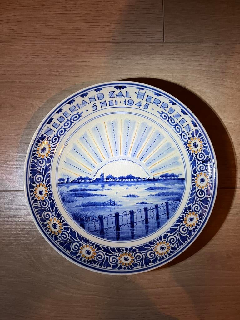 Wandbord Delft Nederland zal herrijzen 1945, Ophalen