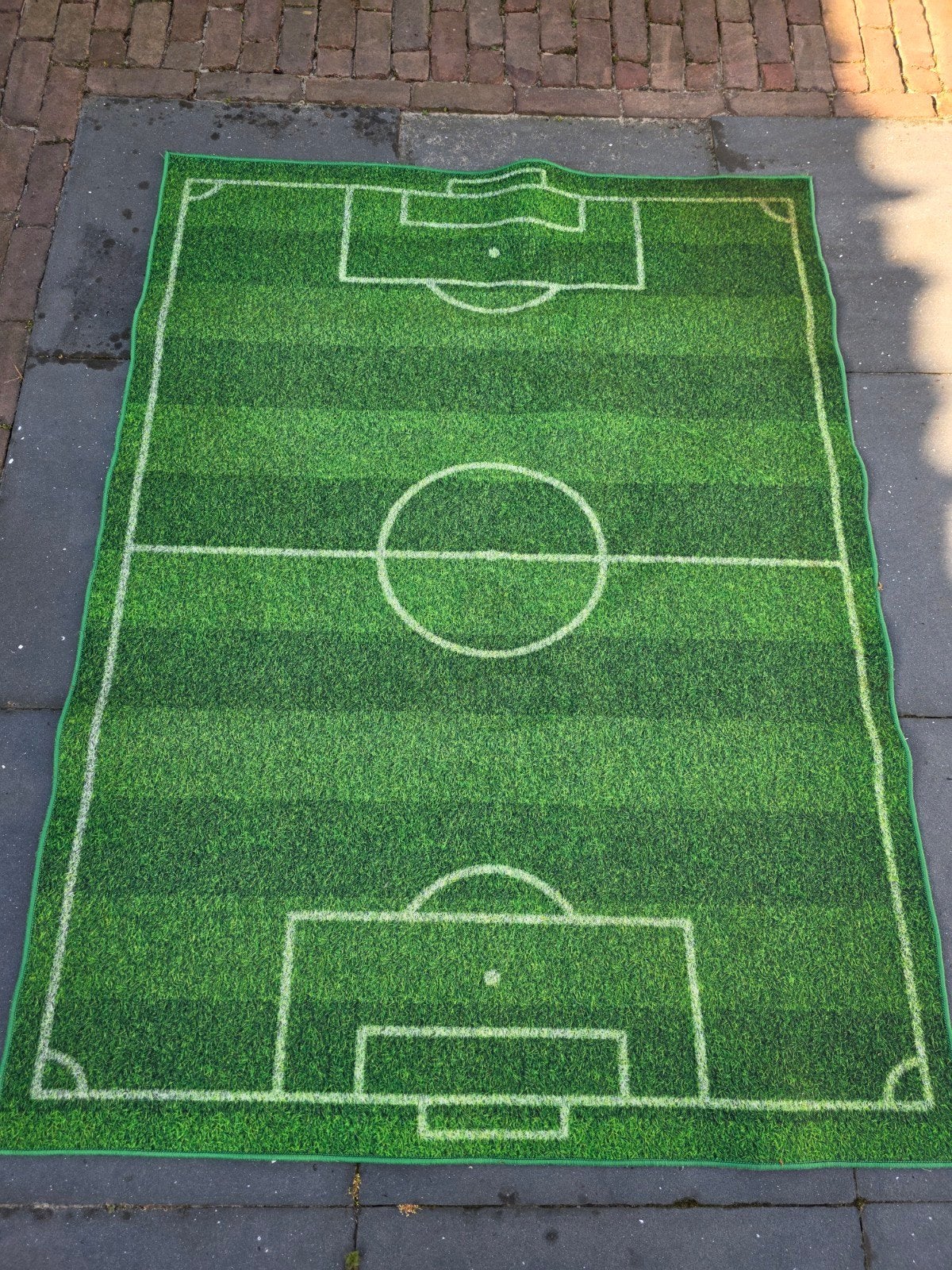 Voetbalkleed, Ophalen
