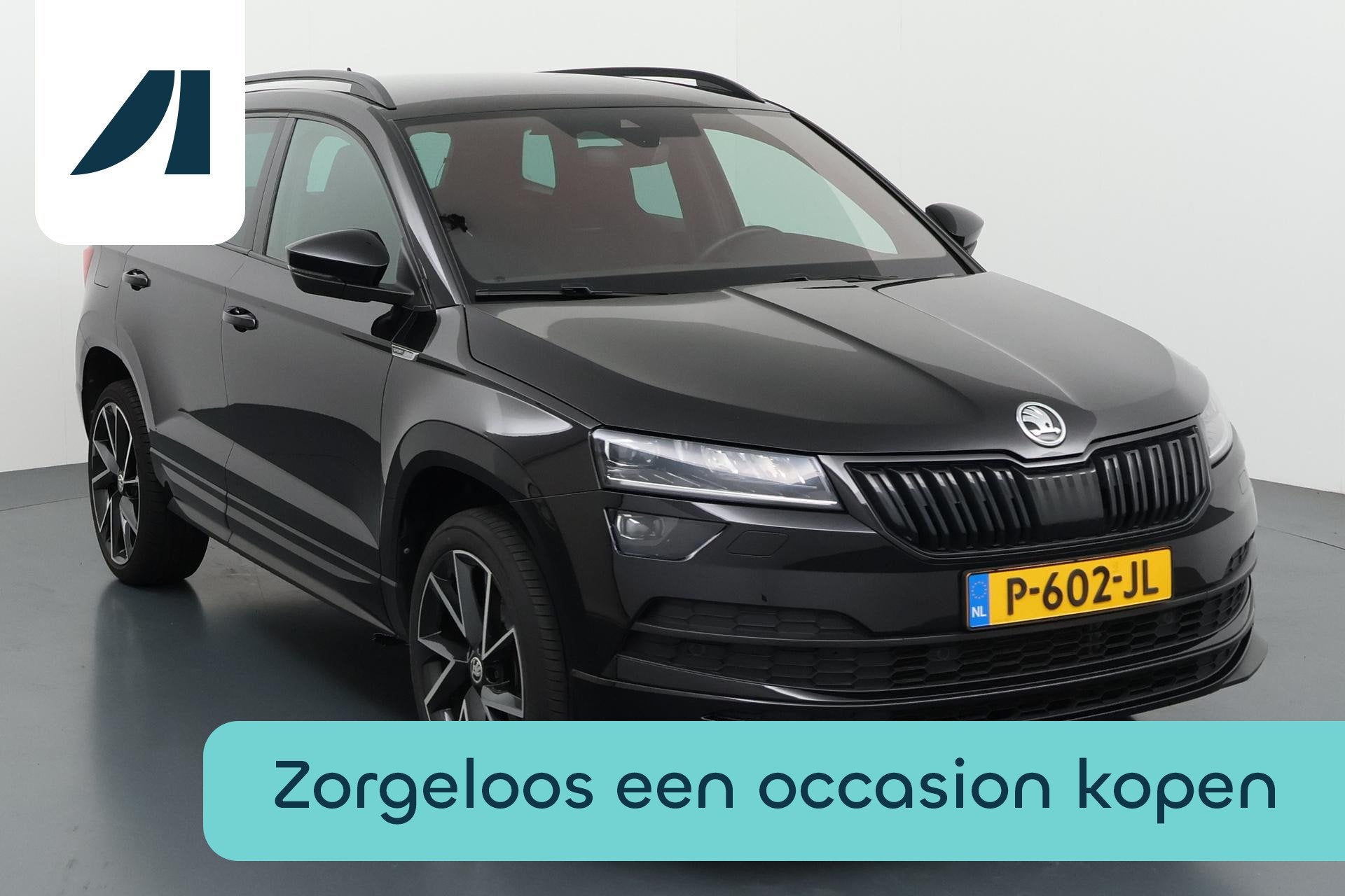 Skoda Karoq 1.5 TSI ACT Sportline Business Sportief silhouet, Auto's, Stof, 4 cilinders, Zwart, 19 km/l