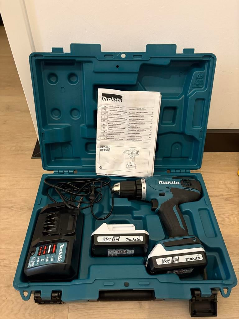Makita DF347D Accuboormachine met 2 accu's en lader, Doe-het-zelf en Verbouw, Gereedschap | Boormachines, Variabele snelheid, Ophalen of Verzenden