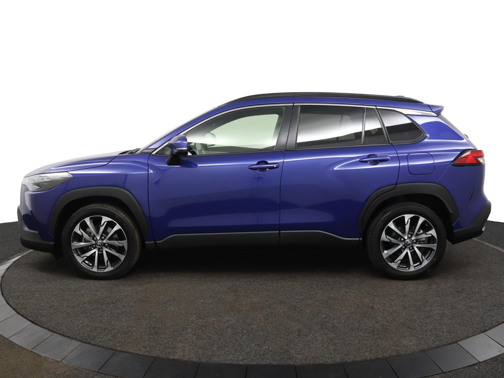 Toyota Corolla Cross Hybrid 200 Style | Stoelverwarming | Pa, Gebruikt, 4 cilinders, Blauw, Leder en Stof