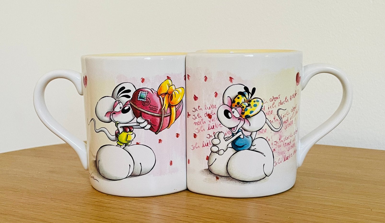 Zeldzame vintage Diddl & Diddlina puzzelmokken, Huis en Inrichting, Ophalen of Verzenden, Zo goed als nieuw, Overige stijlen, Kop(pen) en/of Schotel(s)
