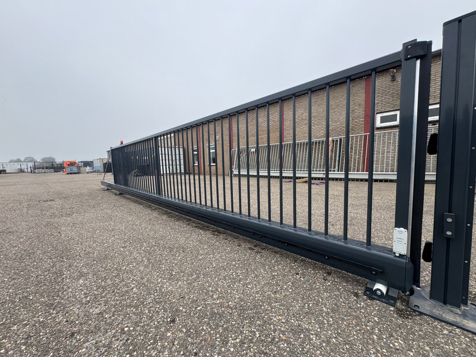 Volautomatische Schuifpoort Kopal  7.00 meter doorgang, Tuin en Terras, Ophalen, Zo goed als nieuw, IJzer