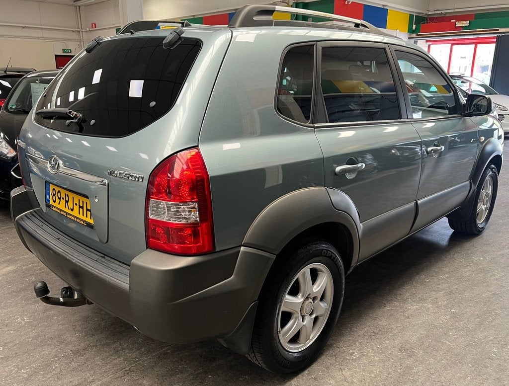 Hyundai Tucson 2.0i 4WD Style 2e eigenaar NAP - Airco, Gebruikt, 4 cilinders, Bedrijf, Handgeschakeld