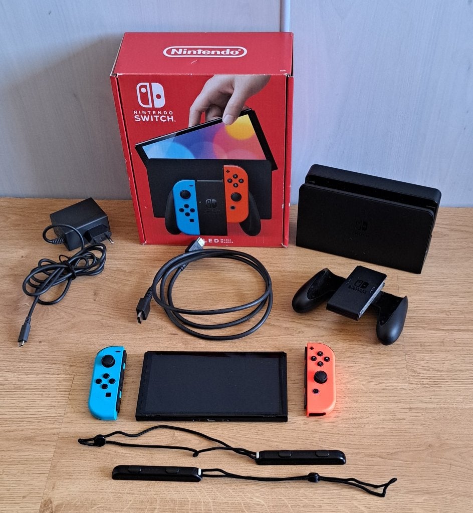 Nintendo Switch OLED 64 GB, Ophalen, Zo goed als nieuw, Met 2 controllers, Switch OLED