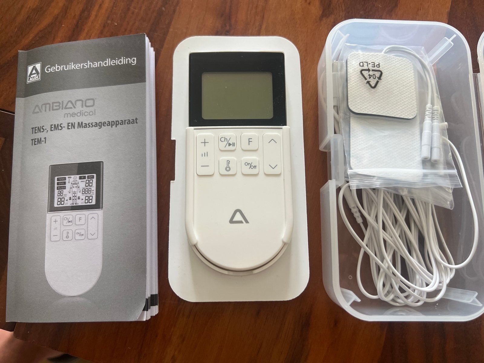 AMBIA NO medical TENS EMS Massageapparaat TEM-1, Sport en Fitness, Ophalen of Verzenden, Nieuw, Apparaat