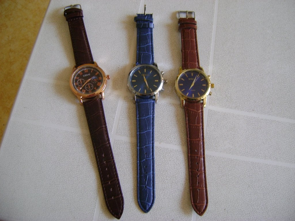 3 heren horloges stanley steele blauwe en bruine van wokai, Ophalen of Verzenden, Zo goed als nieuw