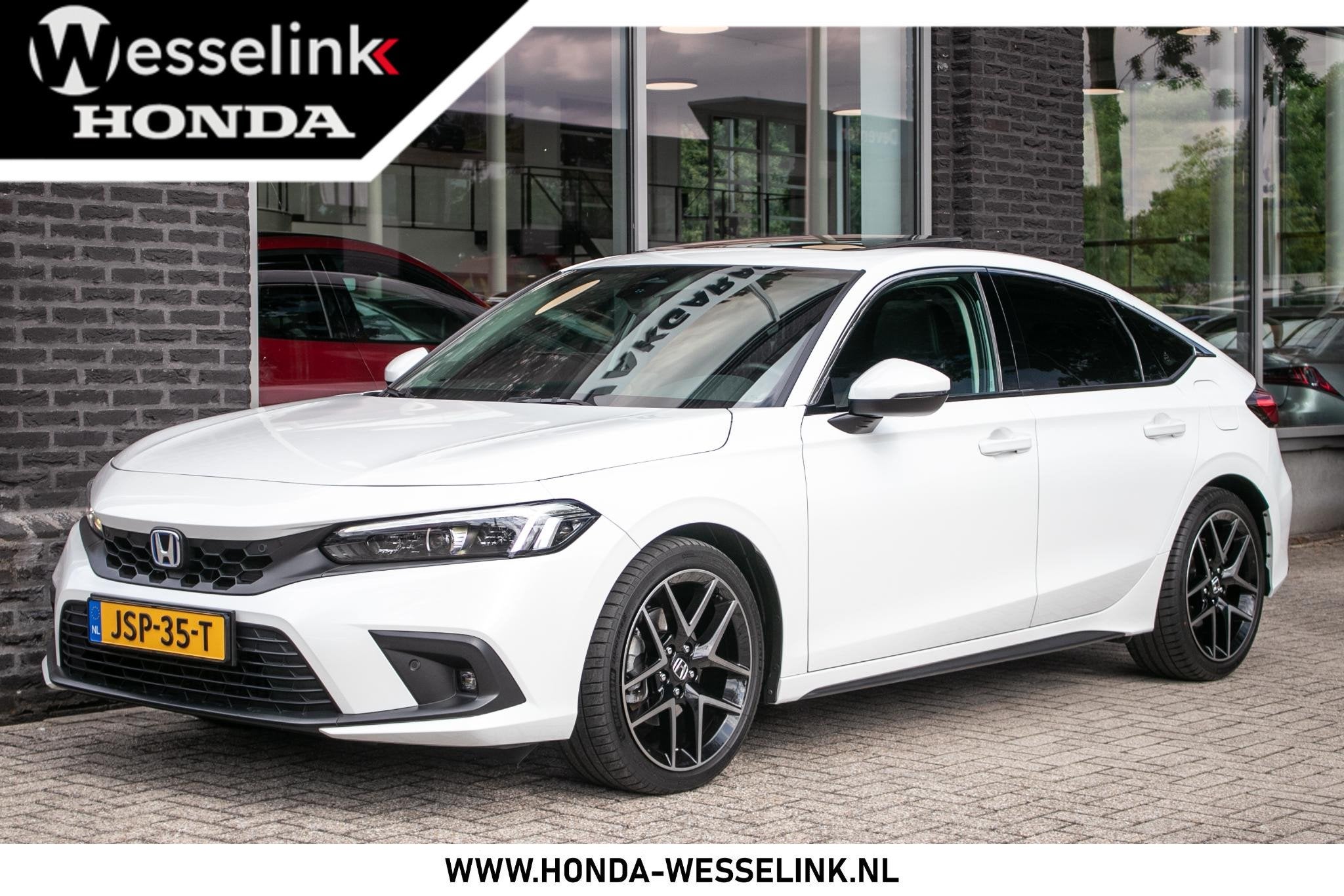 Honda Civic 2.0 e:HEV Advance | Schuifdak | Navi | Leder, Auto's, Dealer onderhouden, Gebruikt, 4 cilinders, Wit
