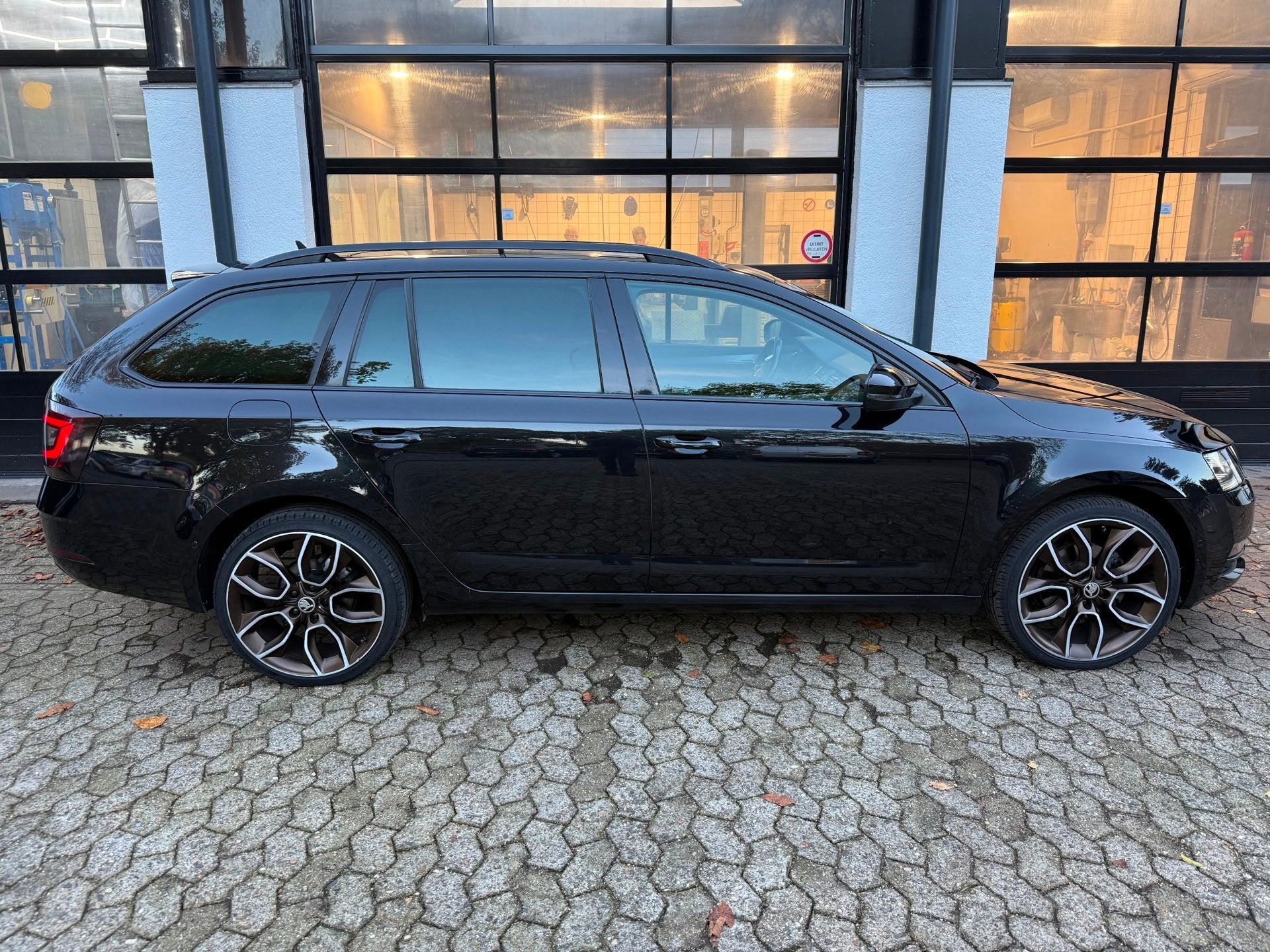 Skoda Octavia Combi 1.0 TSI Greentech Style Business *Clima*, Auto's, Dealer onderhouden, Verwarmde buitenspiegels, 116 pk, Zwart