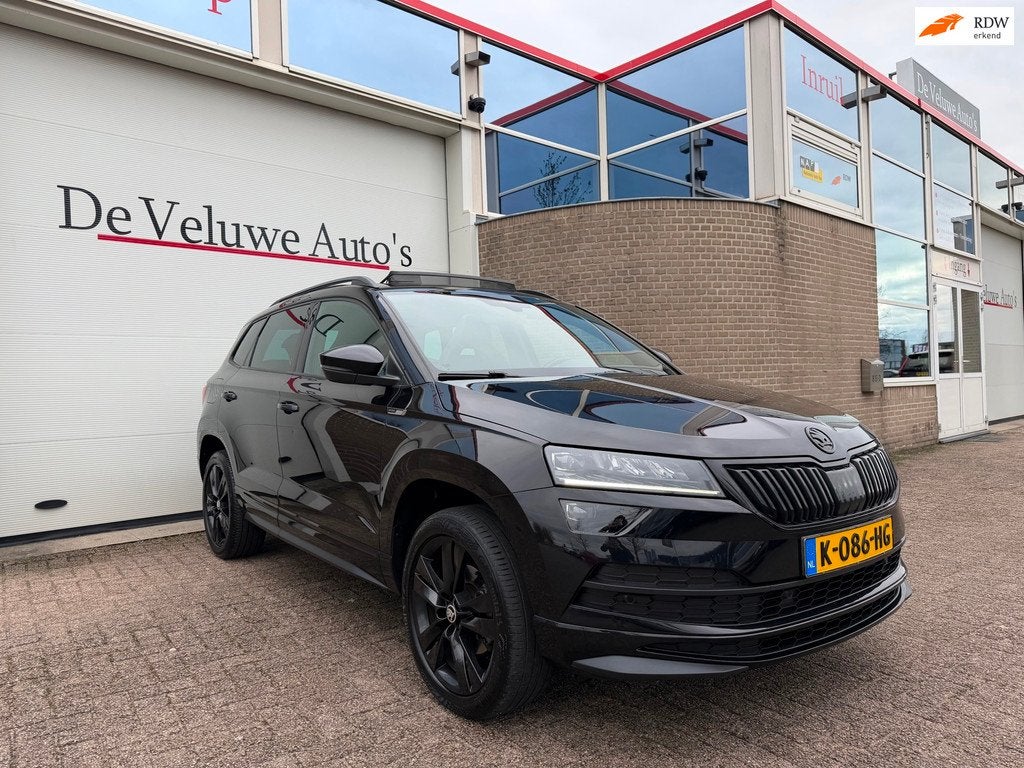 Skoda Karoq 1.5 TSI ACT Sportline Business|PANO|LED|ACC|, Auto's, Skoda, Stof, 4 cilinders, 150 pk, Zwart