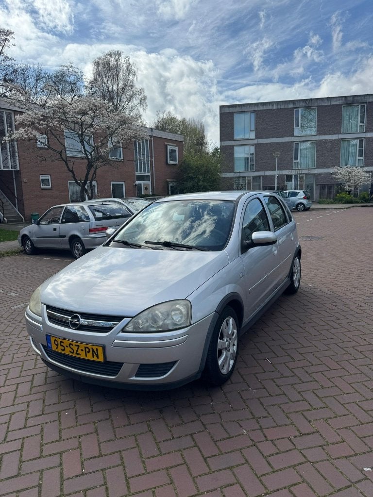 Opel Corsa 1.2 16V Twinport 5D 2006 Grijs, Auto's, Opel, Voorwielaandrijving, Stof, 4 cilinders, 1229 cc