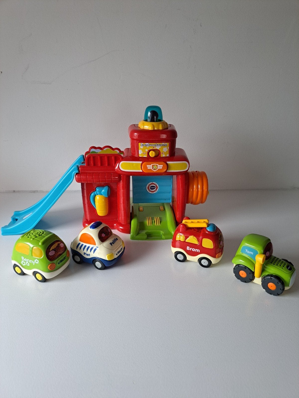 VTech Toet Toet Auto's brandweerkazerne met 4 auto's, Ophalen of Verzenden, Zo goed als nieuw