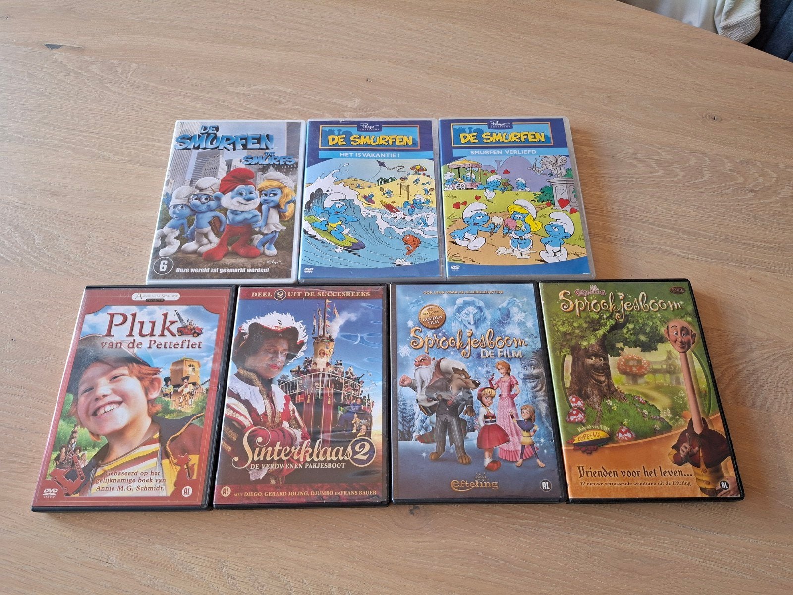 7 Kinder DVD's ( Smurfen, Pluk, Sprookjesboom, Sinterklaas, Animatie, Alle leeftijden, Nederlands, Zo goed als nieuw