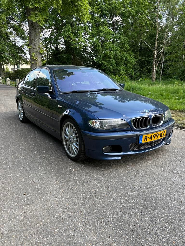 BMW 3-serie 320i M-Sport, Achterwielaandrijving, Blauw, 11 km/l, 75 €/maand