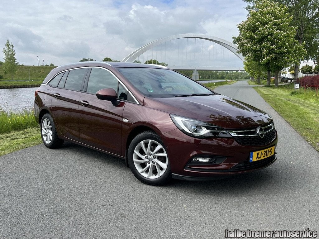 Opel Astra Sports Tourer 1.4 Executive|Trekhaak|Camera|Clima, Voorwielaandrijving, Parkeersensor, Gebruikt, 4 cilinders