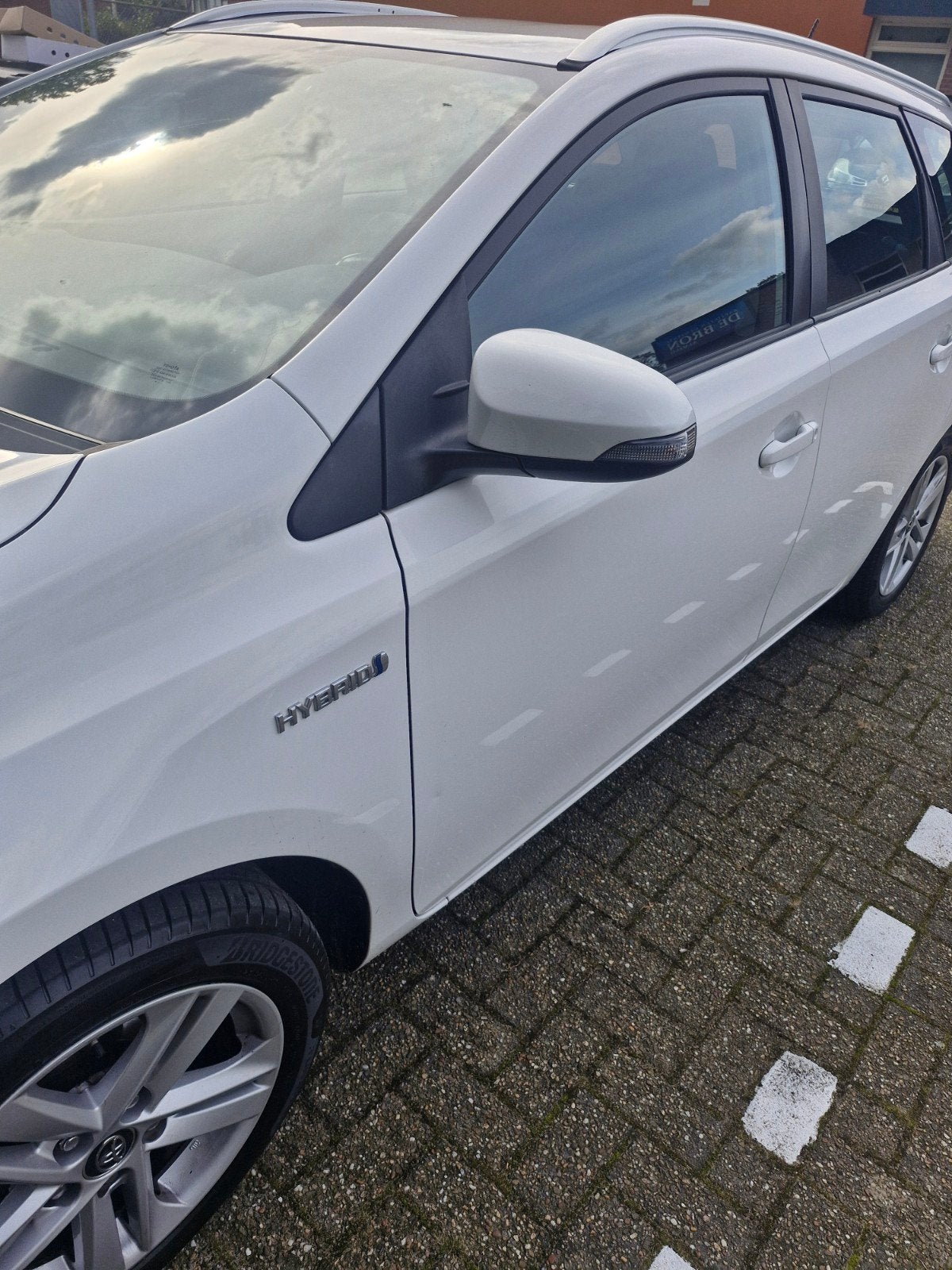 Toyota Auris 1.8 Hybrid Touring Sports CVT 2015 Wit, Auto's, Dealer onderhouden, Zwart, 345 kg, Adaptive Cruise Control