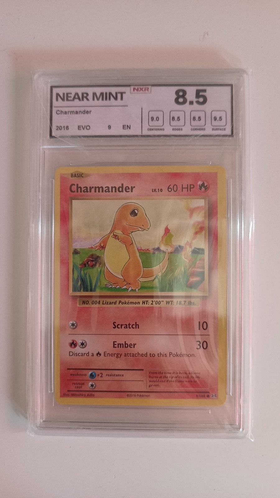 Pokémon Charmander 2016 EVO NXR 8.5 Graded Kaart, Ophalen of Verzenden, Zo goed als nieuw, Losse kaart