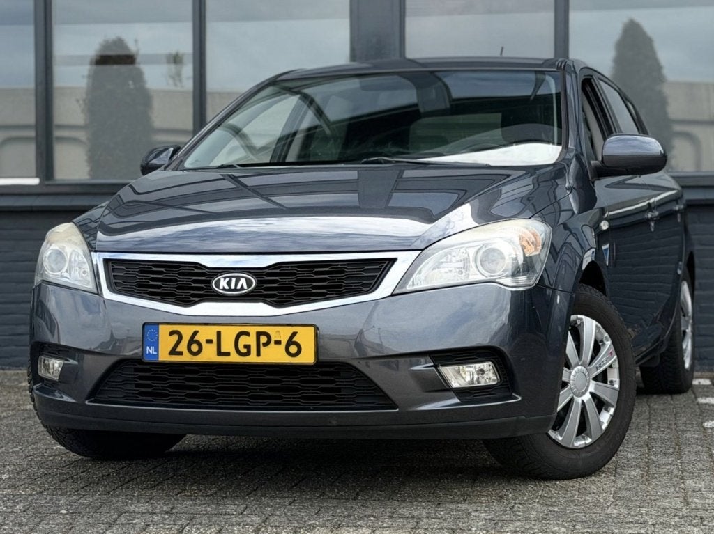 Kia cee'd 1.4 CVVT Seven |Airco |CruiseC |Navi |Nwe Apk, Auto's, 1163 kg, Euro 5, Gebruikt, 4 cilinders
