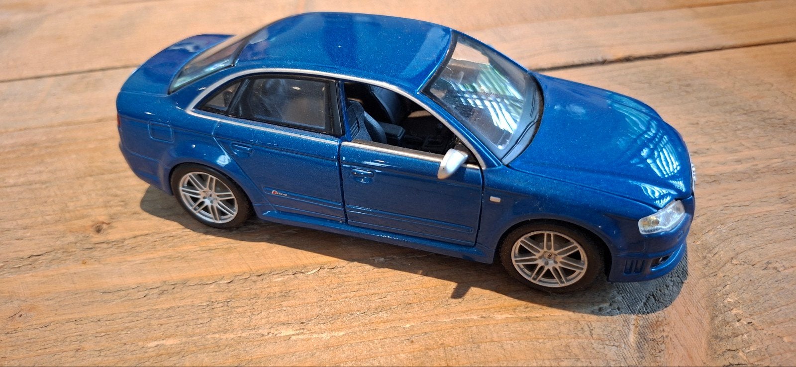 Bburago blauwe Audi RS4, Ophalen of Verzenden, Zo goed als nieuw, Auto, Overige merken