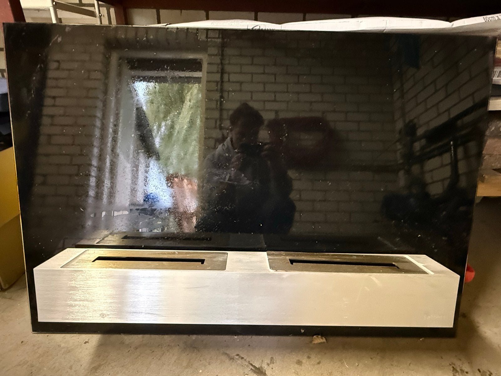 Moderne gelhaard met zwart glazen paneel, Huis en Inrichting, Ophalen, Gebruikt, Vrijstaande haard, Gelhaard