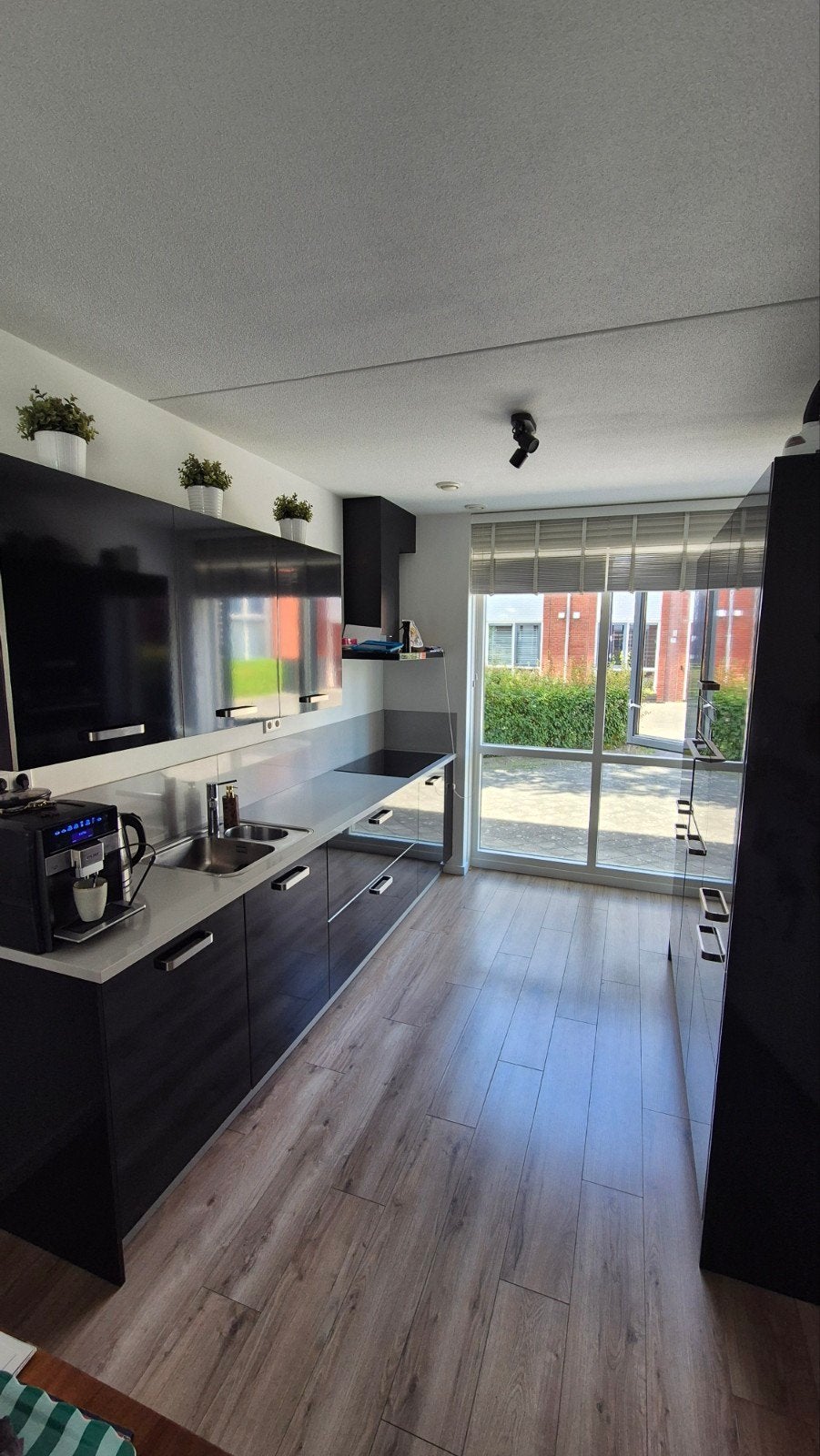 Hoogglans zwarte parallel keuken uit 2013, Huis en Inrichting, Keuken | Complete keukens, Ophalen, Gebruikt, Zwart, Enkelwandige keuken