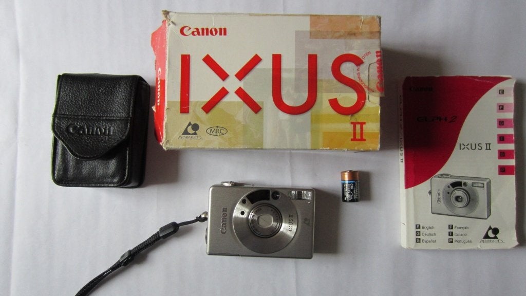 CANON IXUS II compact-camera, leren Canon tasje, handleiding, Ophalen of Verzenden, Zo goed als nieuw, Compact, Canon