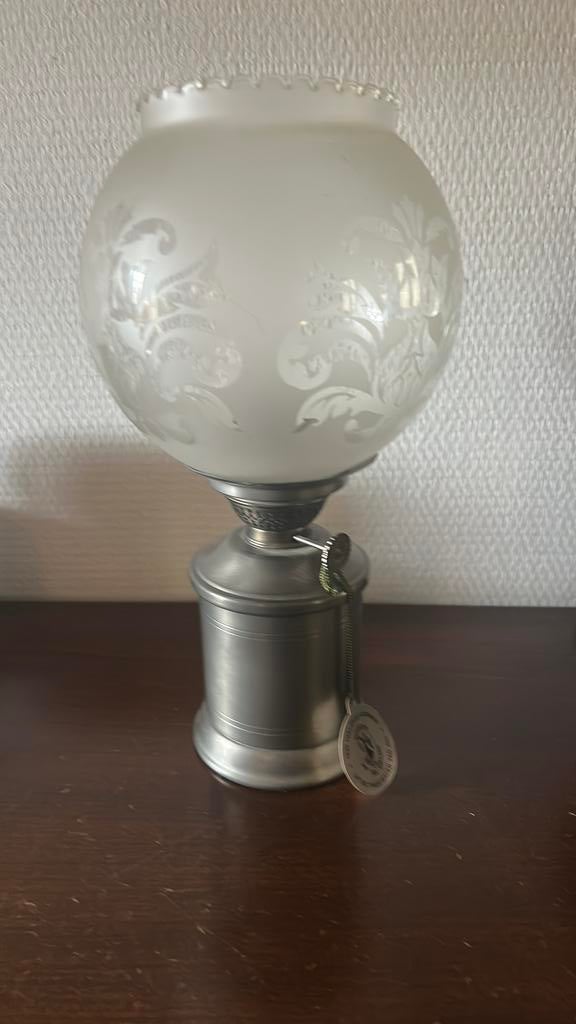 Tinnen lamp, Ophalen