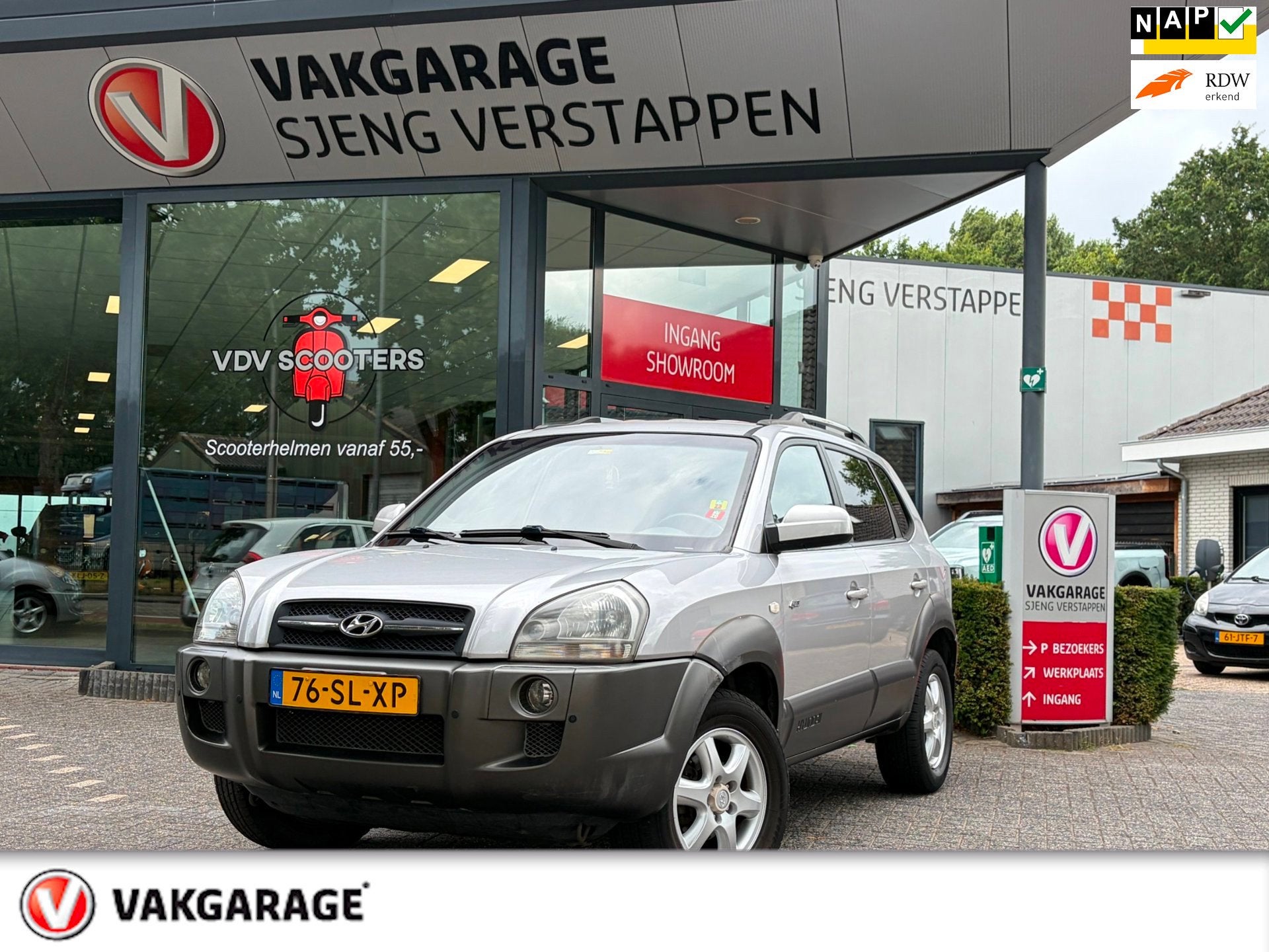 Hyundai Tucson 2.7i V6 4WD Style Automaat, Auto's, Automaat, Automatische klimaatregeling, Gebruikt, Beige