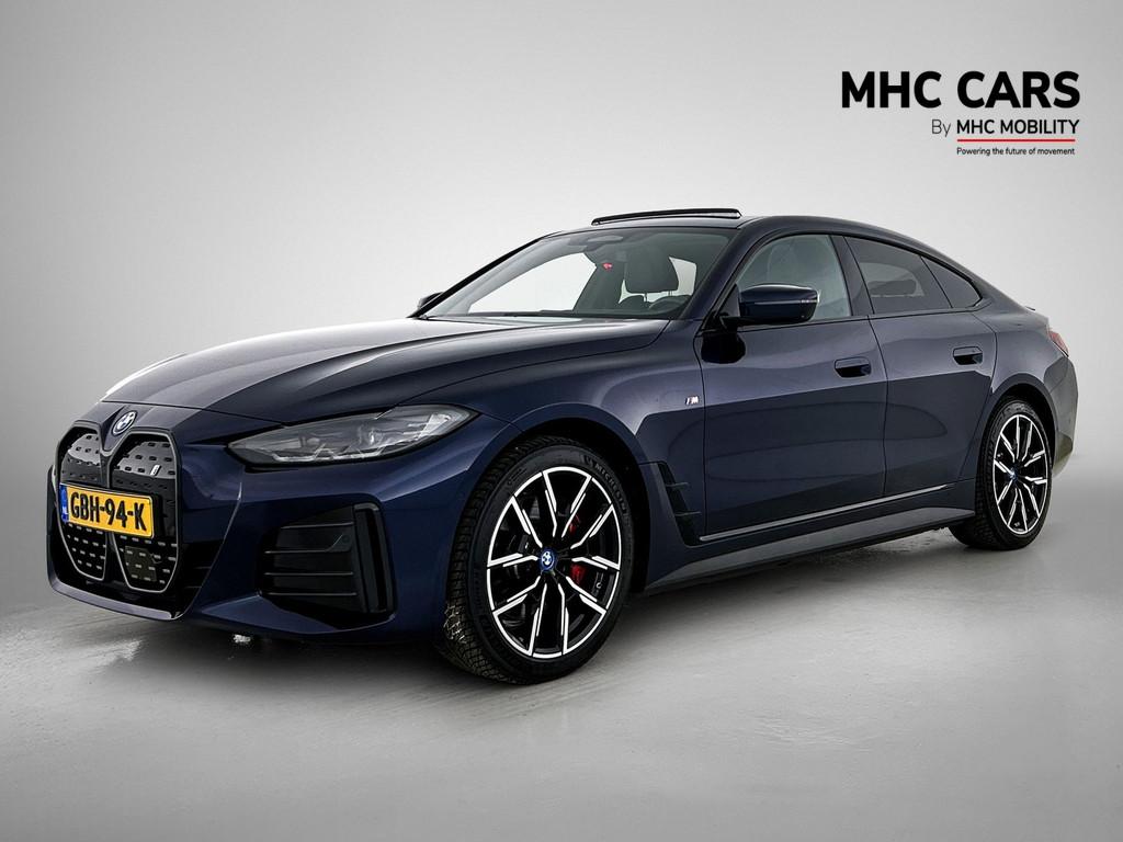 BMW i4 eDrive40 High Executive 84 kWh | M Sportpakket Pro |, Auto's, BMW, Gebruikt, Zwart, Adaptive Cruise Control, Blauw
