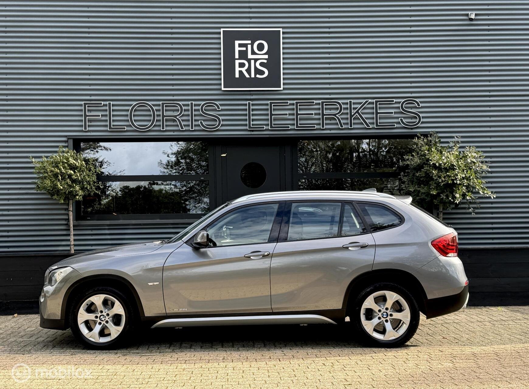 BMW X1 xDrive28i | 6 Cilinder | Zwart Leer | Xenon | Navi, Auto's, Gebruikt, 258 pk, 2996 cc, Bedrijf