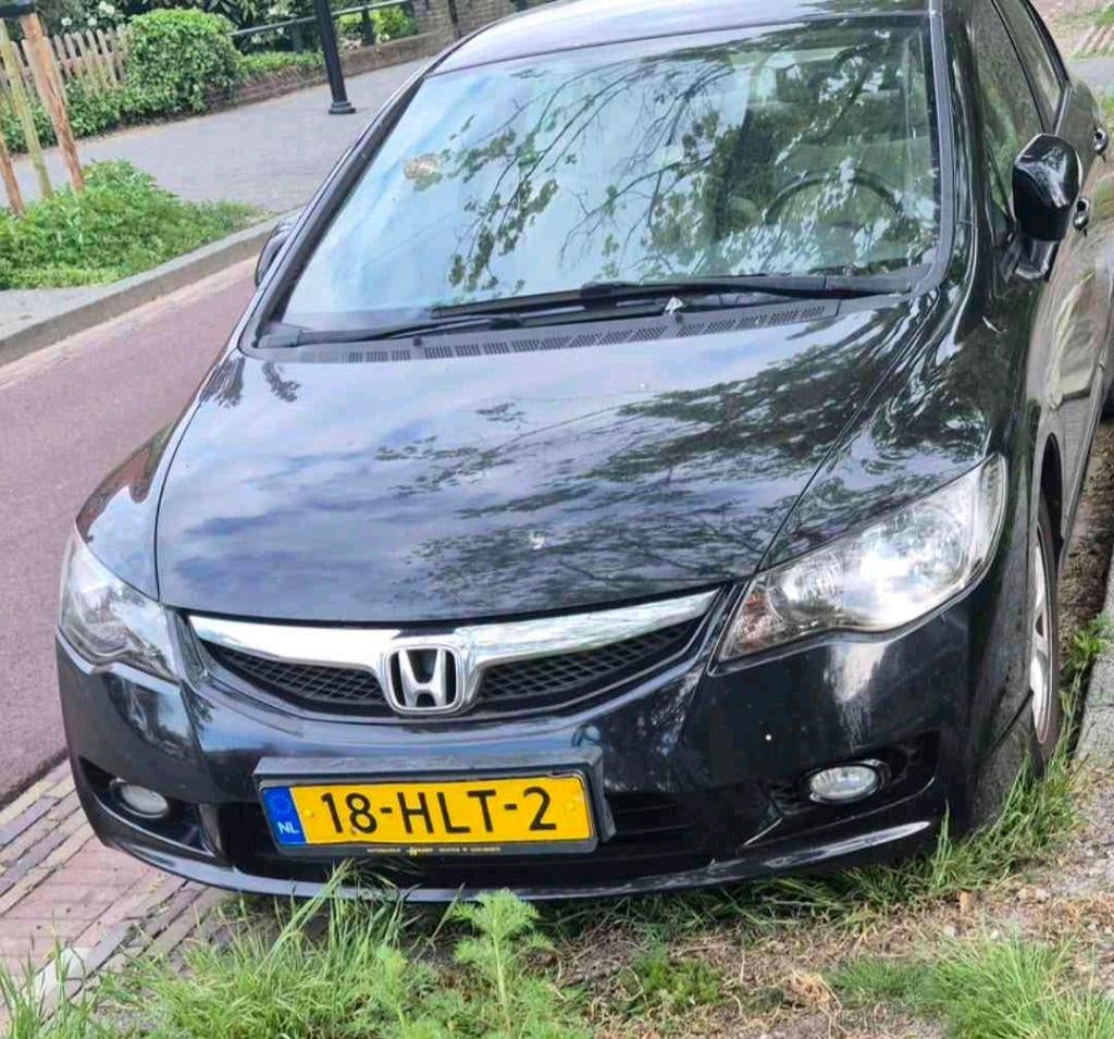 Honda Civic 1.3 Vtec Hybrid 4DR C-tr. 2009 Zwart, Auto's, Zwart, 22 km/l, Sedan, 1339 cc