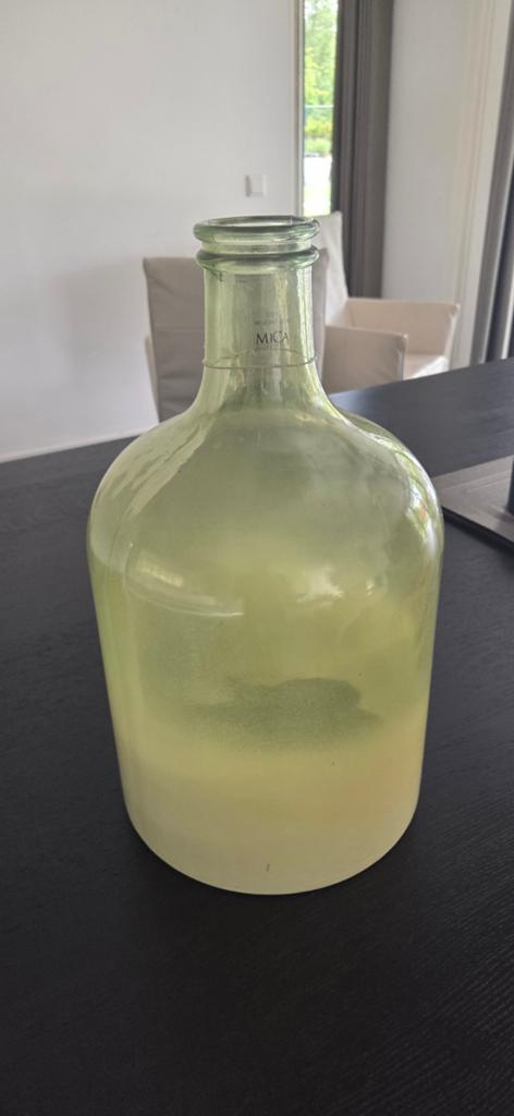 Mica fles, Ophalen