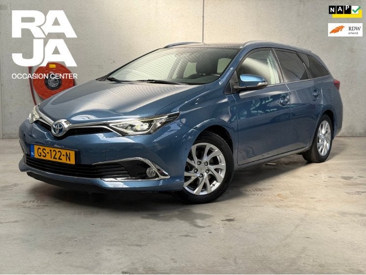 Toyota Auris Touring Sports 1.8 Hybrid Lease pro NAP Clima C, Auto's, Toyota, Gebruikt, Euro 6, Blauw, Leder en Stof