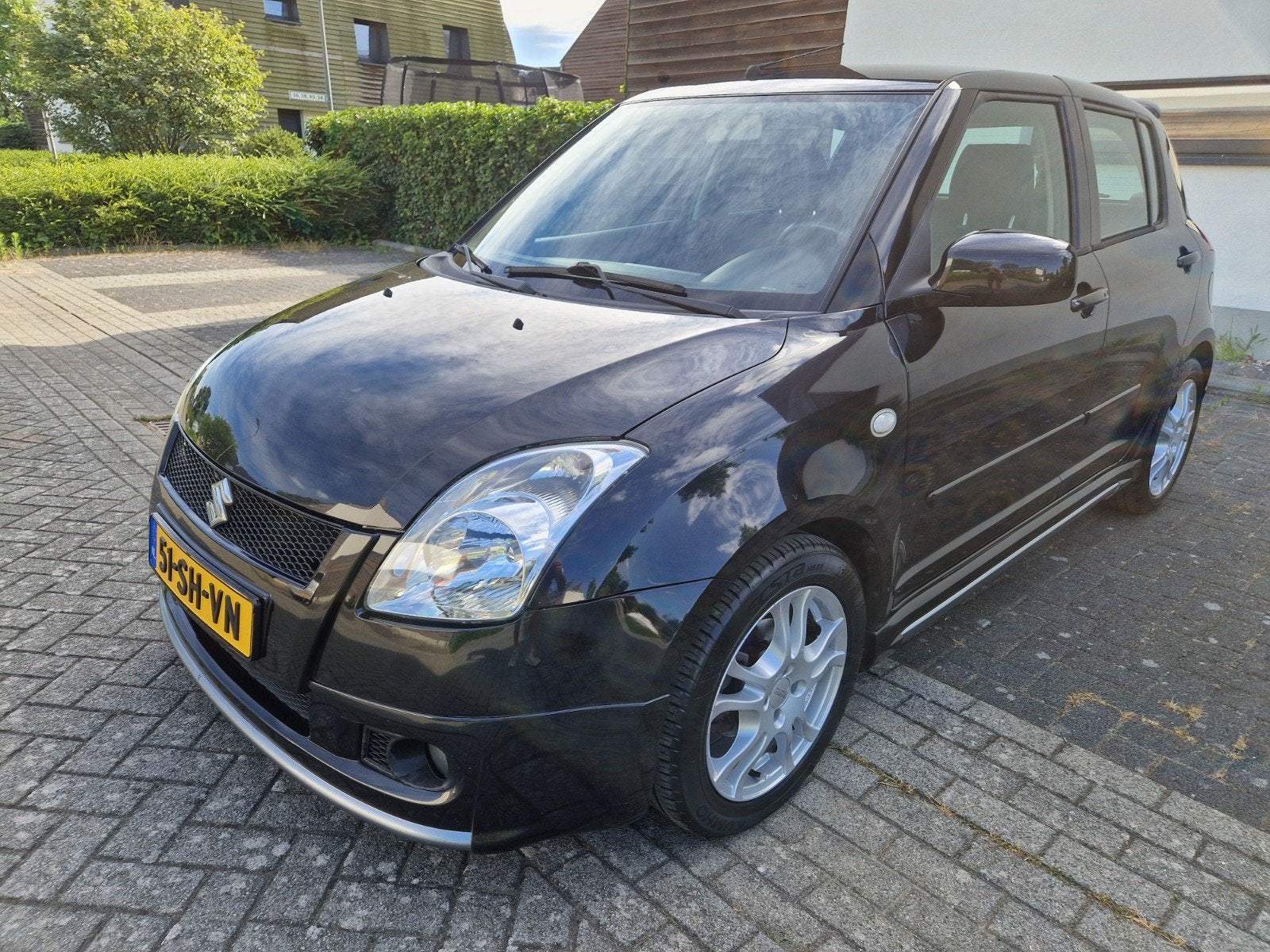 Suzuki Swift 1.5 5D 2006 Zwart, Auto's, Voorwielaandrijving, 40 €/maand, 4 cilinders, 400 kg