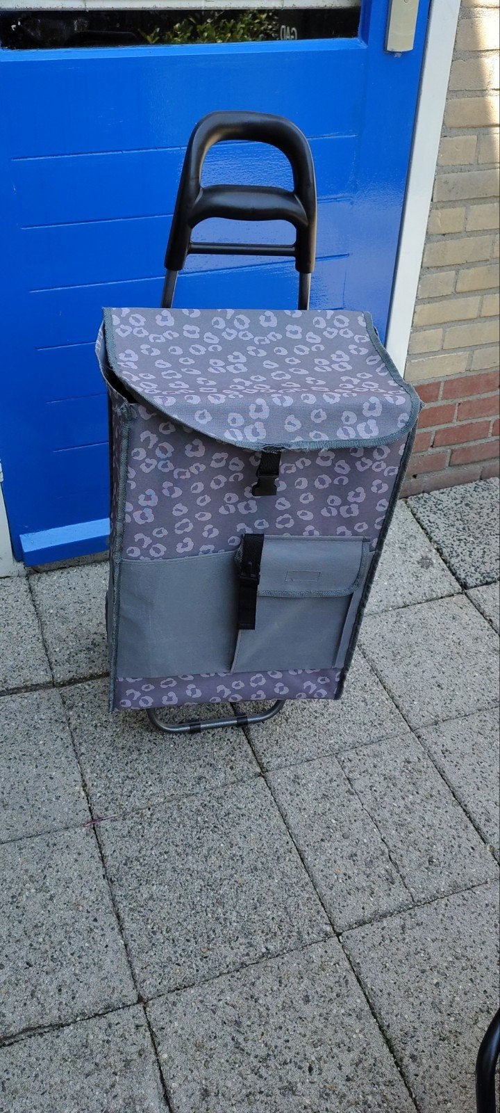 Boodschappen tas op wielen, Ophalen