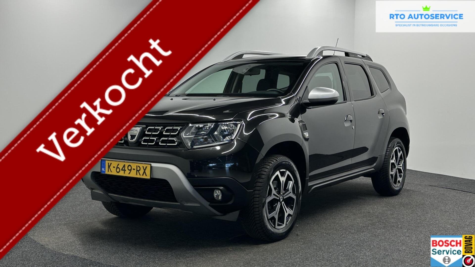 Dacia Duster 1.0 TCe Bi-Fuel Prestige CAMERA LEER NAVI CARPL, Auto's, Voorwielaandrijving, Gebruikt, 4 cilinders, Zwart