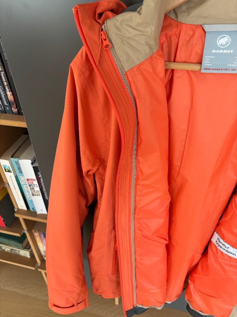 Te koop aangeboden: Mammut dames jas mt L, Ophalen, Nieuw, Maat 42/44 (L), Oranje